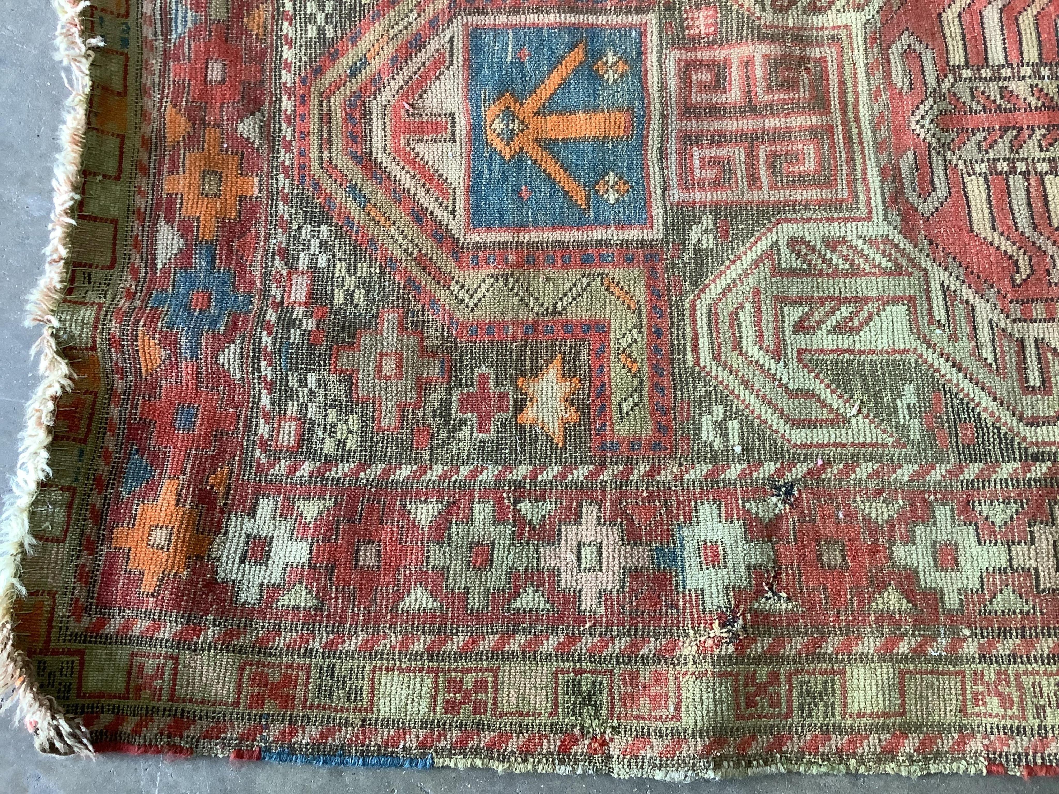 An antique Lenkoran prayer rug, 122 x 93cm. Condition - fair